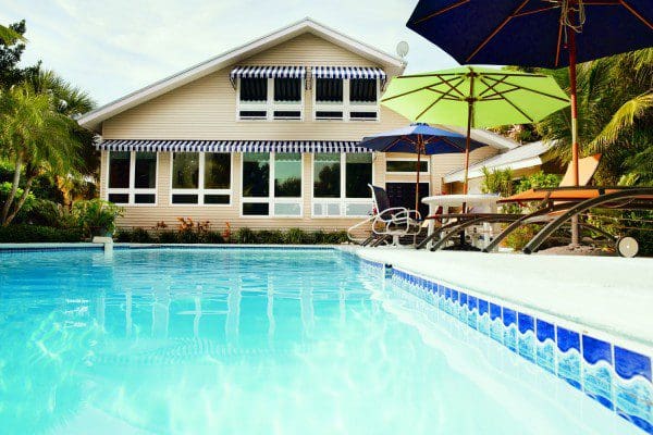 Awning windows by pool, Central Florida home