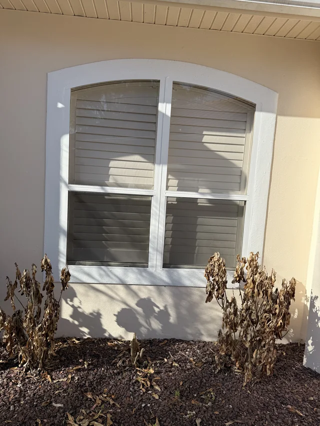 The original arched window before replacement.